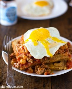 Breakfast of ultimate waffles with an egg 