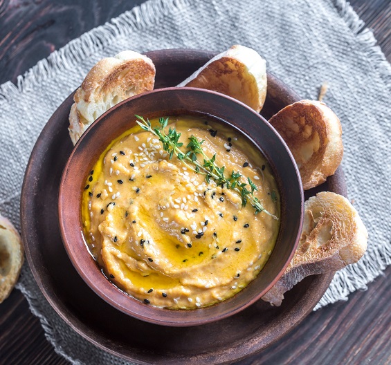 Bowl of pumpkin hummus