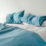 A disheveled looking bed. Should you make your bed?